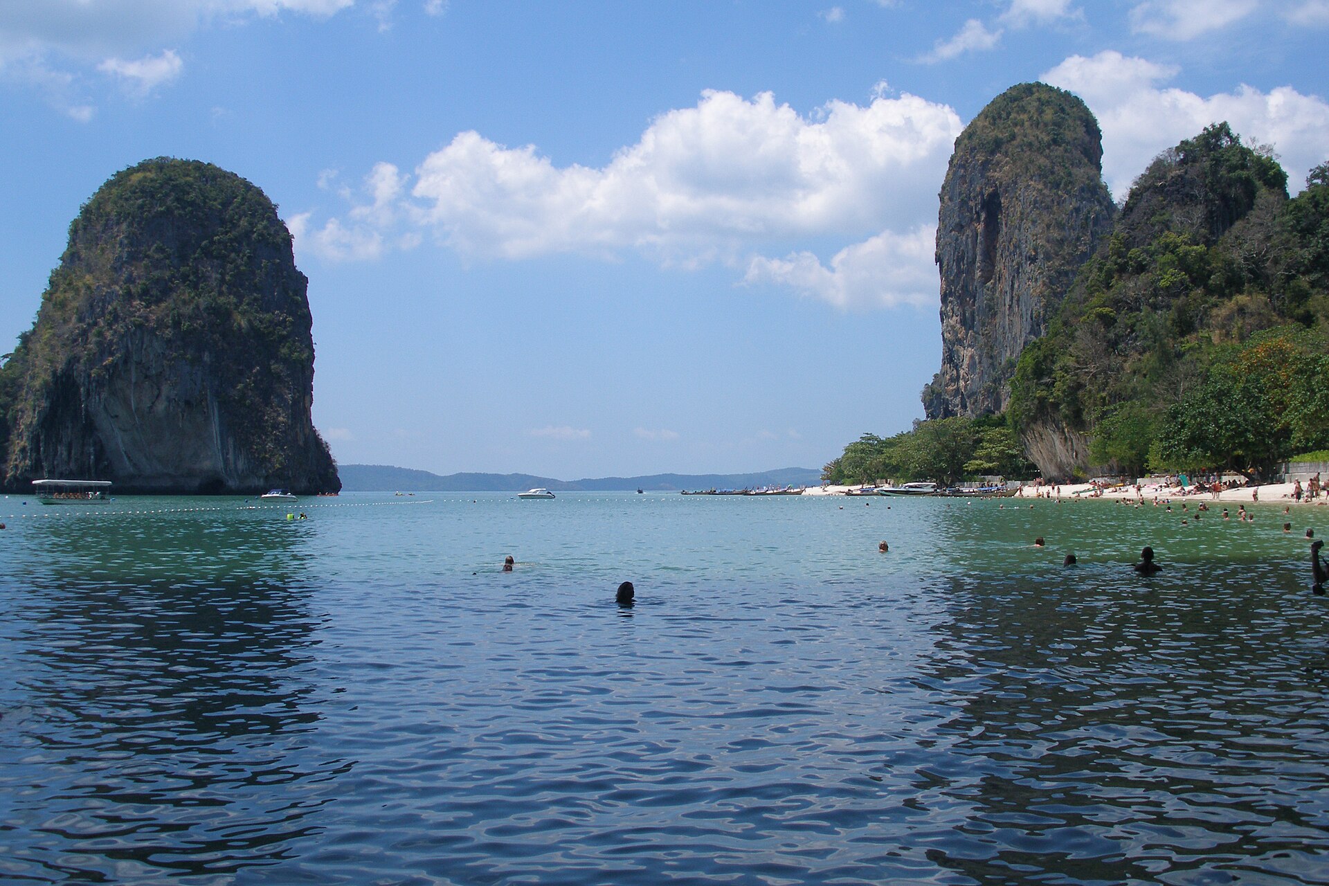 Railay beach from the water, limestone cliffs on both sides, Krabi